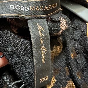 A Black lace blouse still look new, BCBGMaxazria brand.